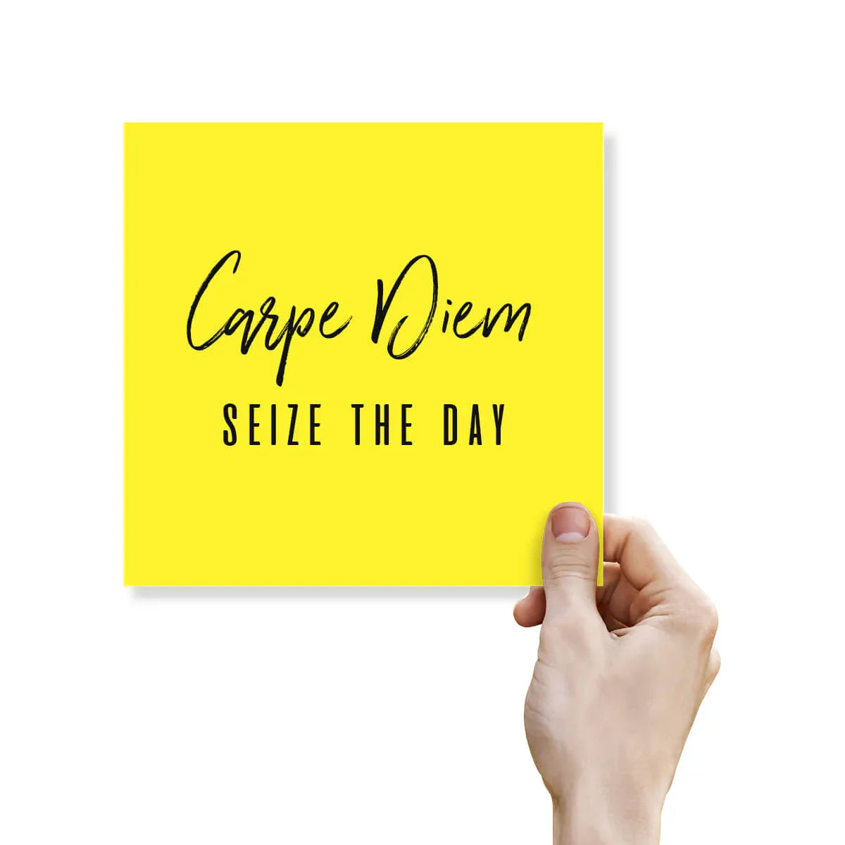 Hand holding a yellow inspirational greeting card with 'Carpe Diem Seize The Day' text