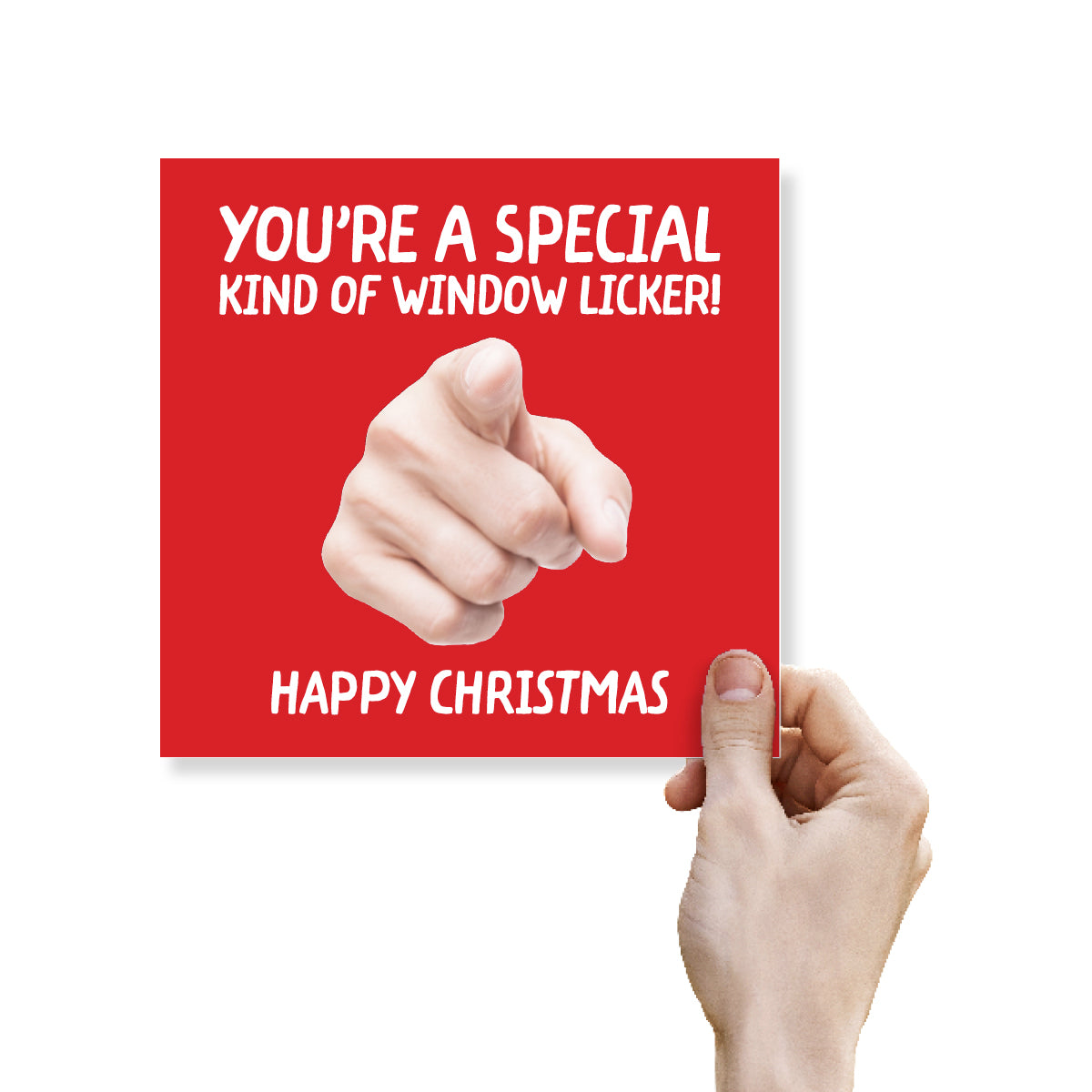 A hand holding a square red Christmas greeting card with white text that reads 'YOU'RE A SPECIAL KIND OF WINDOW LICKER! HAPPY CHRISTMAS' and a pointing hand graphic in the center, against a light gray background.