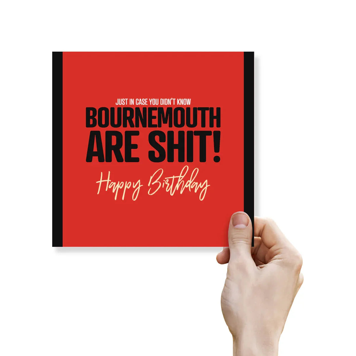Hand holding a red card with black and white text on a white background