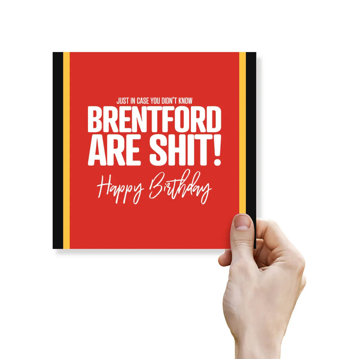 Hand holding a red card with white text on a white background