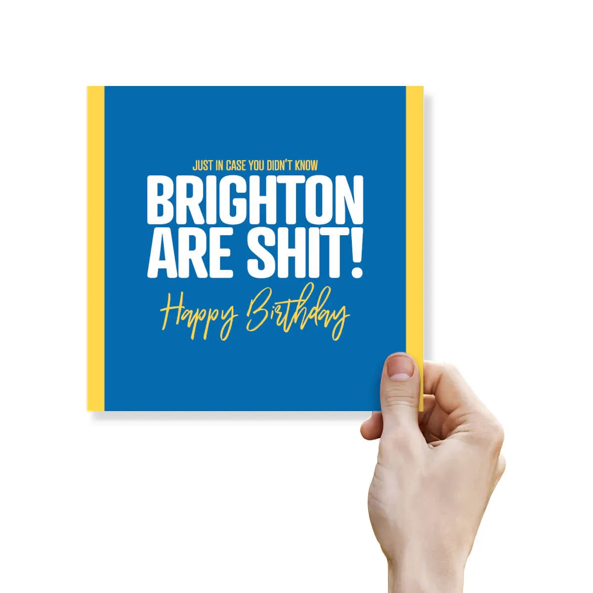 Hand holding a blue card with yellow text on a white background