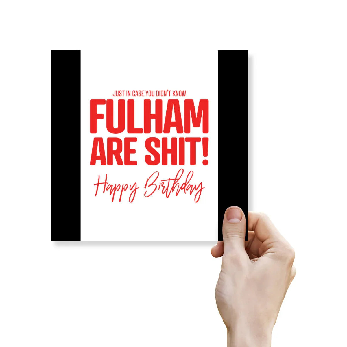 Hand holding a card with red text on a white background