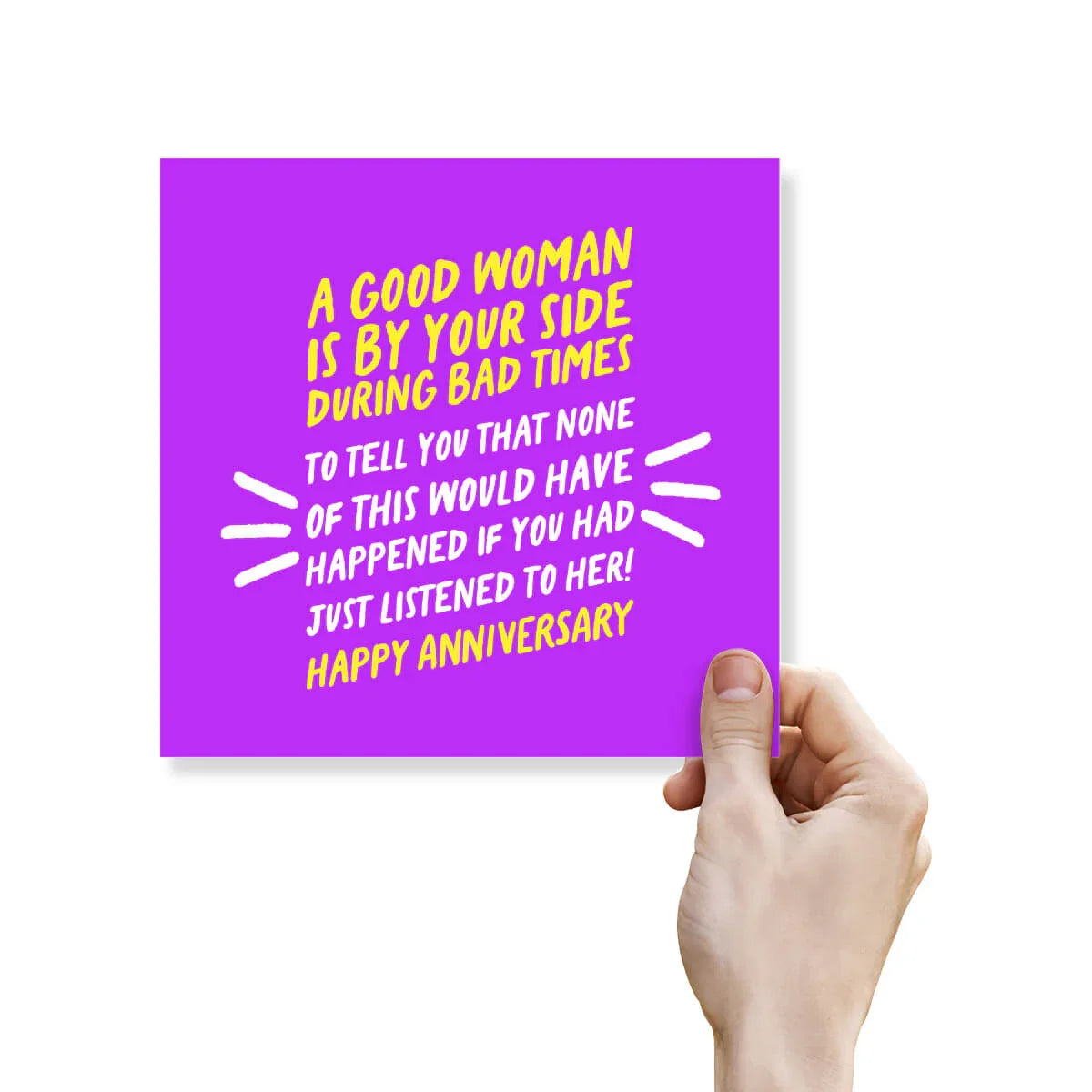Funny anniversary card with bold yellow and white text on purple background, held by a hand.