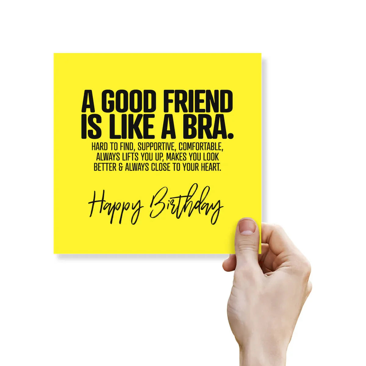 Hand holding a yellow card with birthday message on a white background