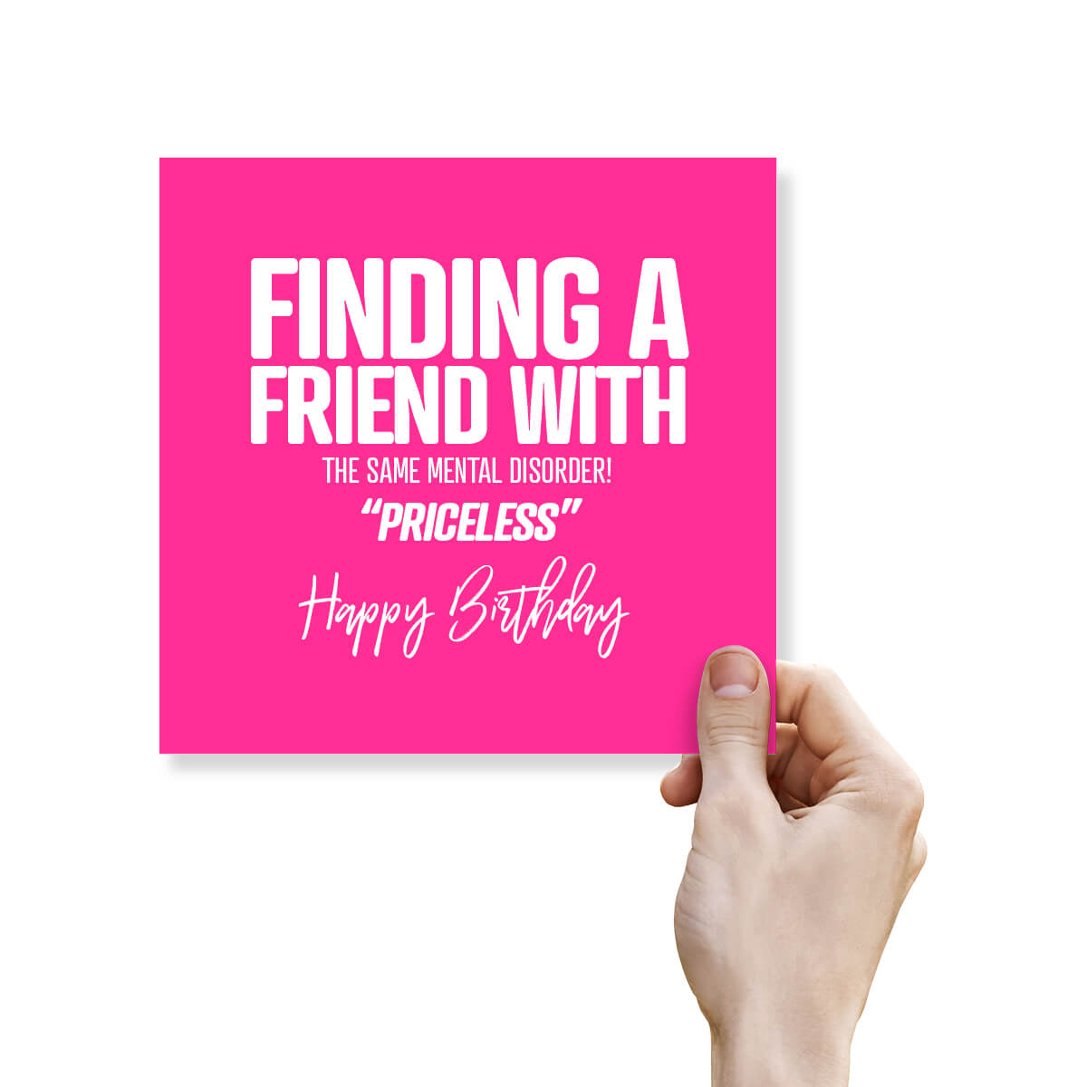 Hand holding a pink birthday card with humorous text on a white background