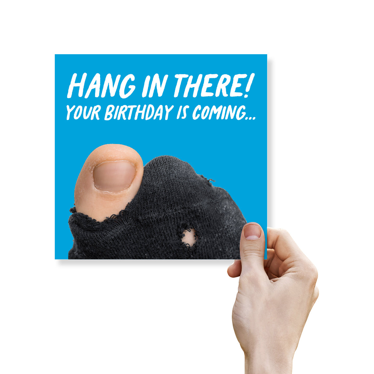 Card with Hang in there! Your birthday is coming...' text on a blue background, held by a hand.