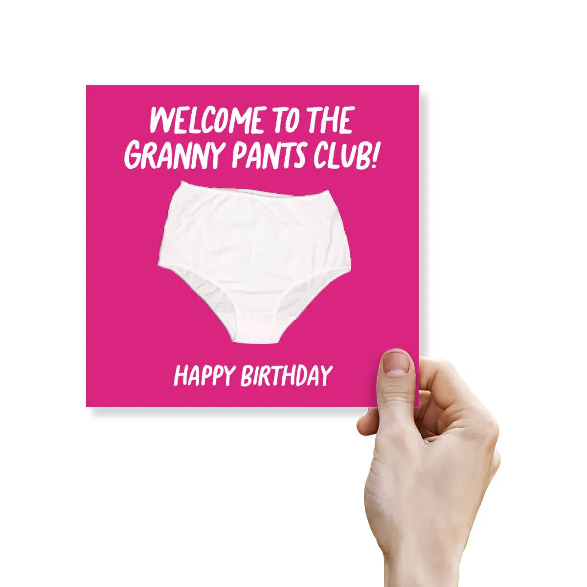 Funny birthday card with white granny pants illustration on pink background, held by hand