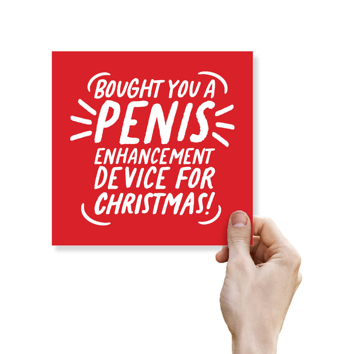 Red card with white text 'Bought you a penis enhancement device for Christmas!' held by a hand.