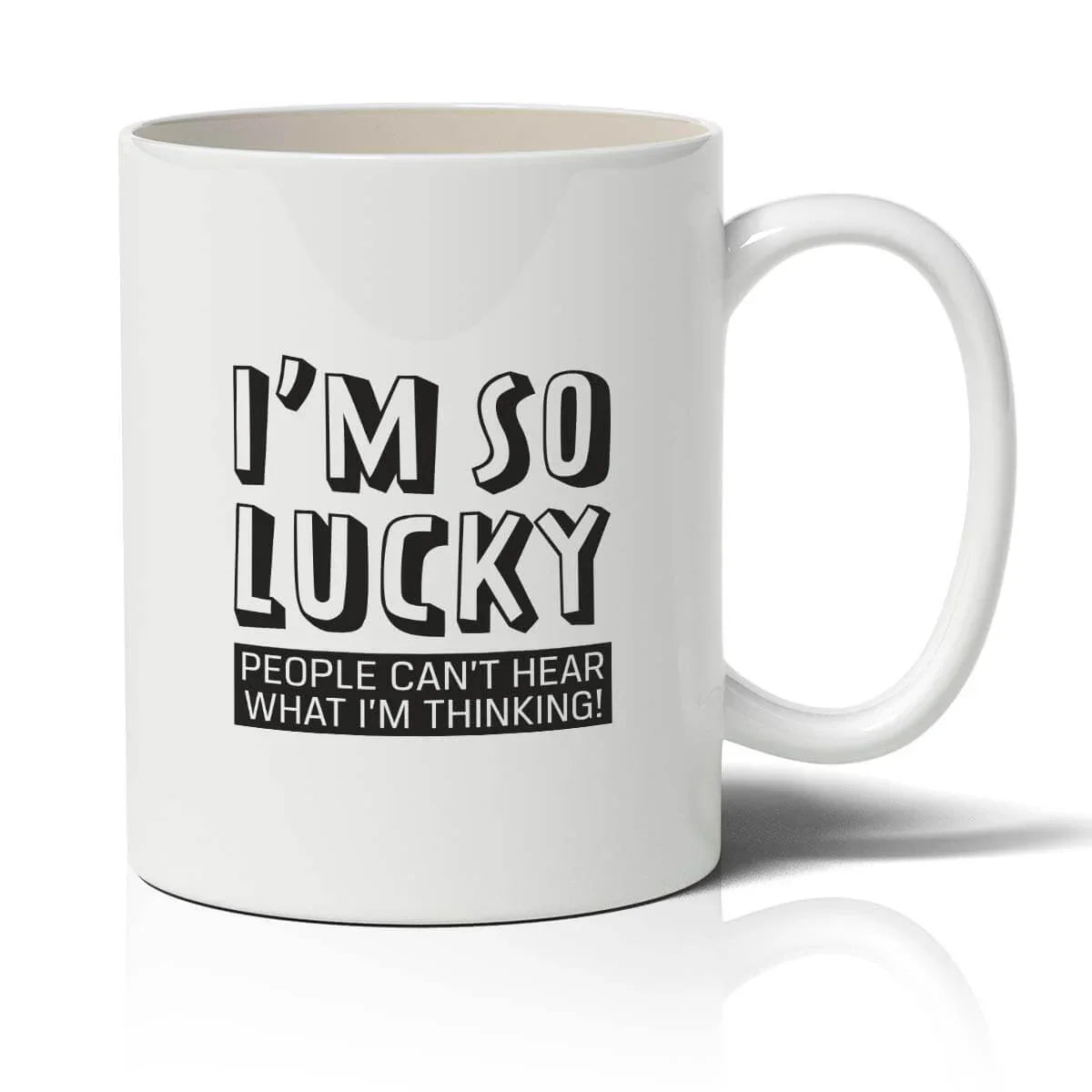 White mug with black text 'I'm so lucky people can't hear what I'm thinking!' on a white background