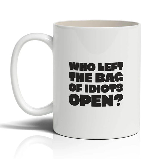White mug with black text 'WHO LEFT THE BAG OF IDIOTS OPEN?' on a white background