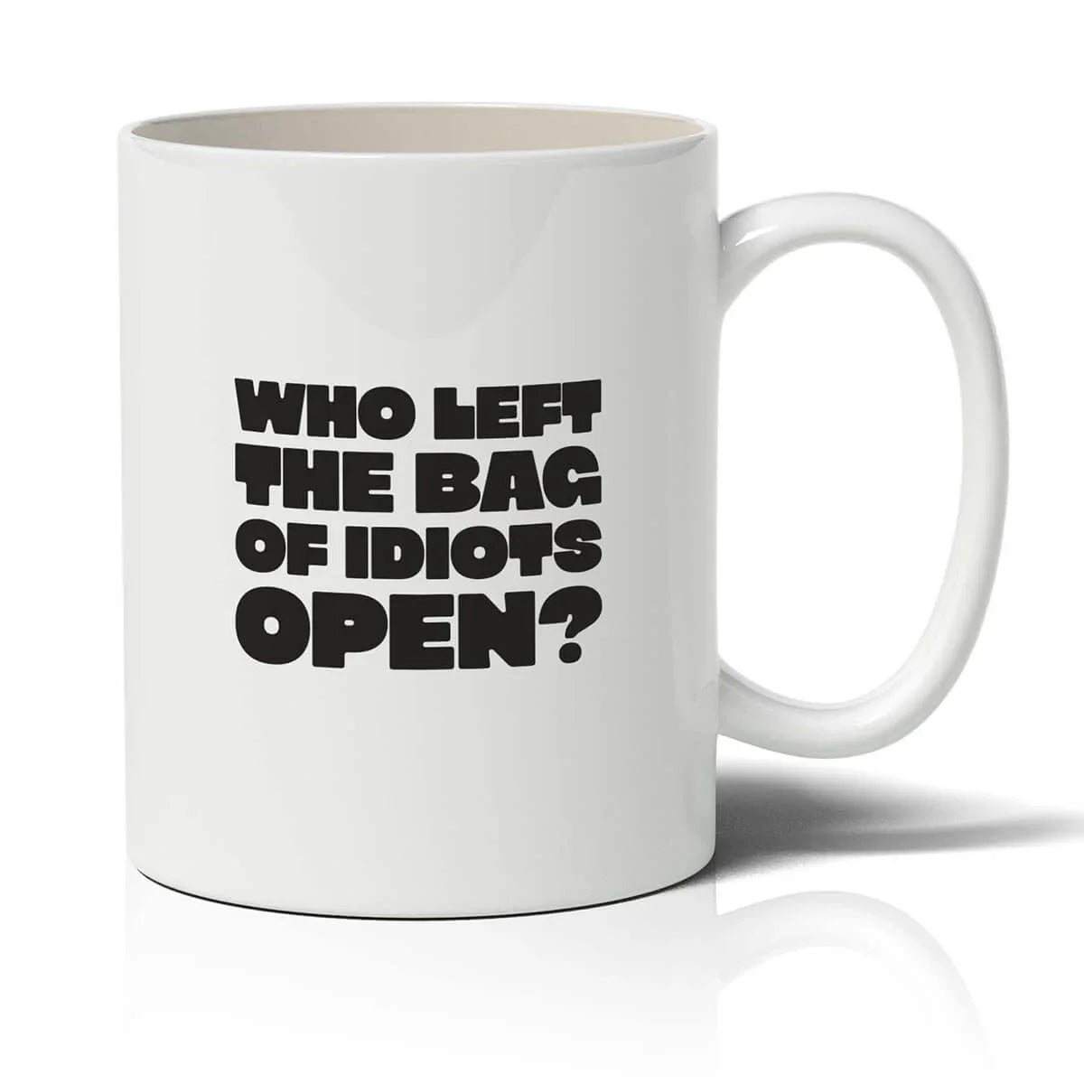 White mug with black text 'WHO LEFT THE BAG OF IDIOTS OPEN?' on a white background