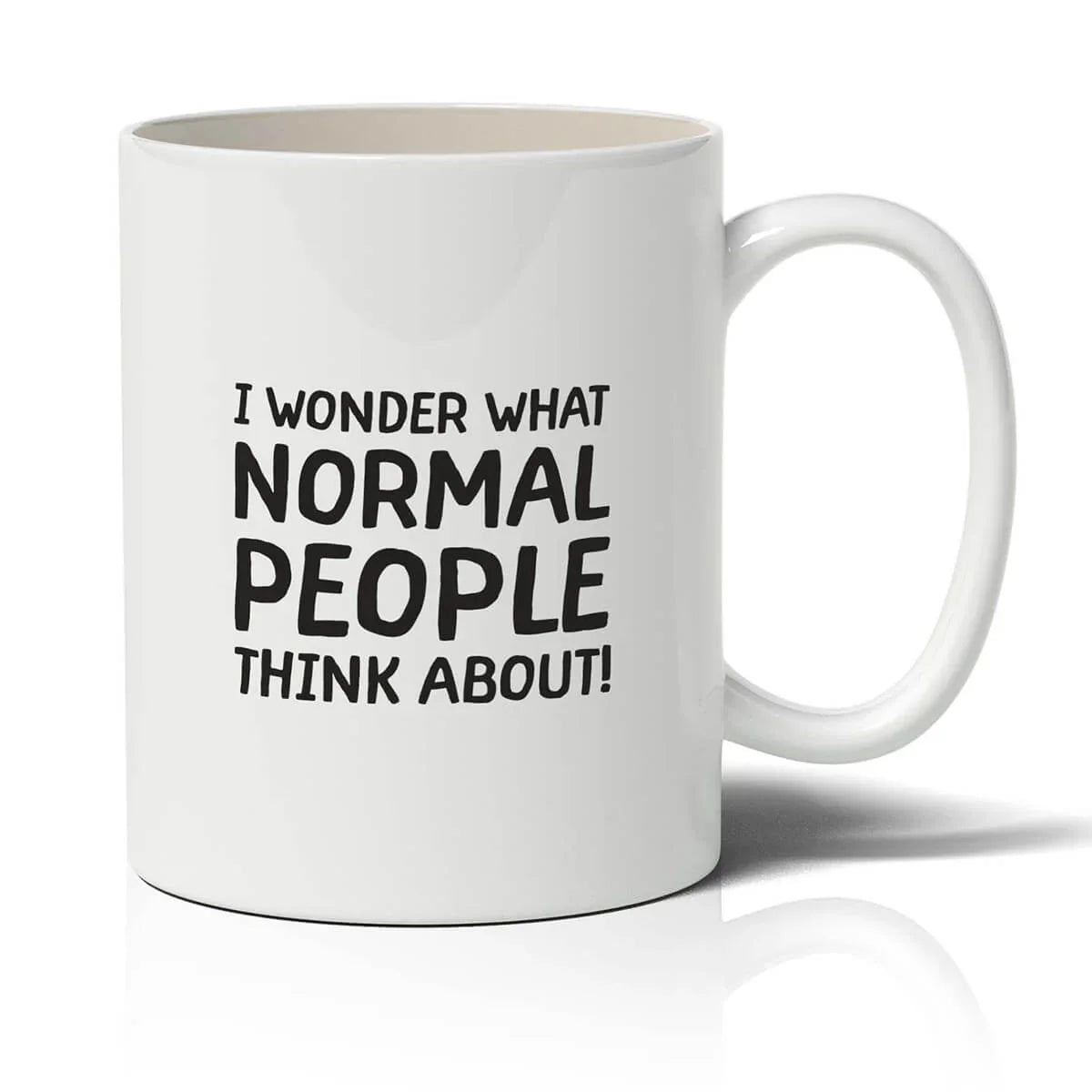 White mug with black text 'I wonder what normal people think about!' on a white background