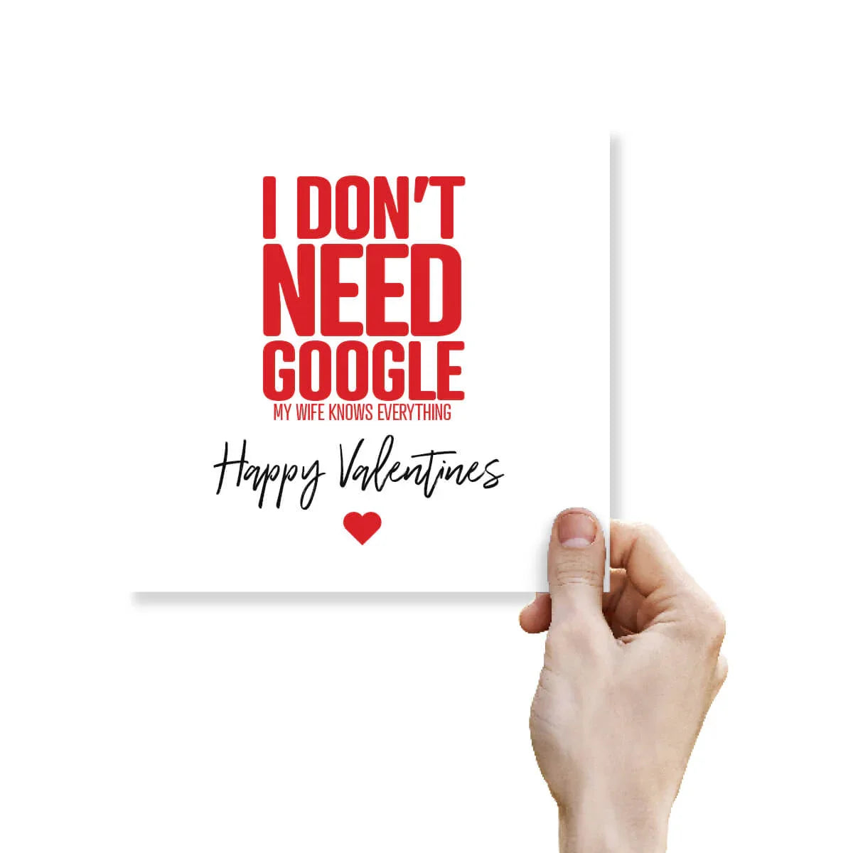 Funny Valentine’s Day card with "I don't need Google, my wife knows everything" text, held by hand.