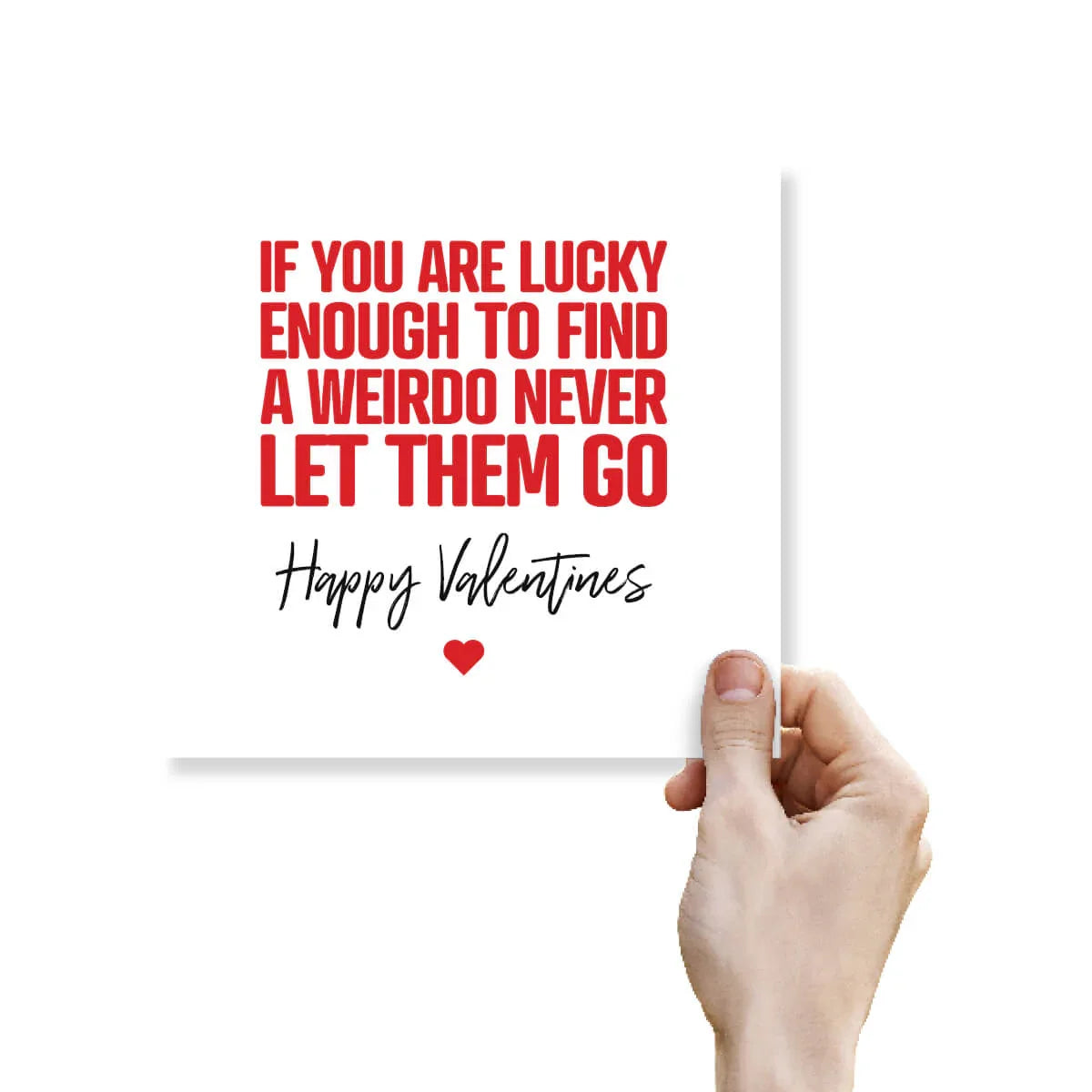 Funny Valentine's Day card with bold red text and heart, held in a hand on white background