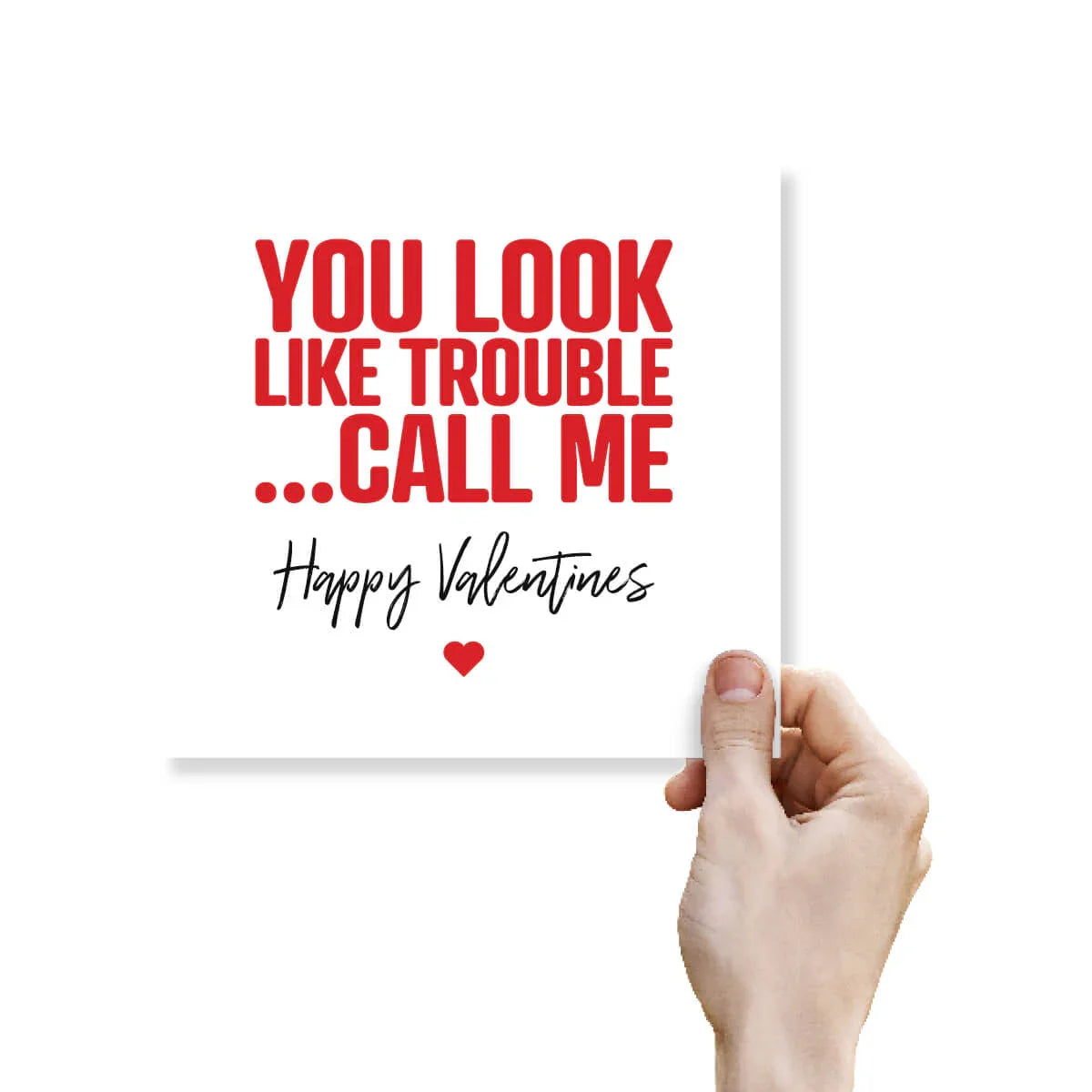 Funny cheeky Valentine’s Day card reading 'You look like trouble... Call me' held by a hand