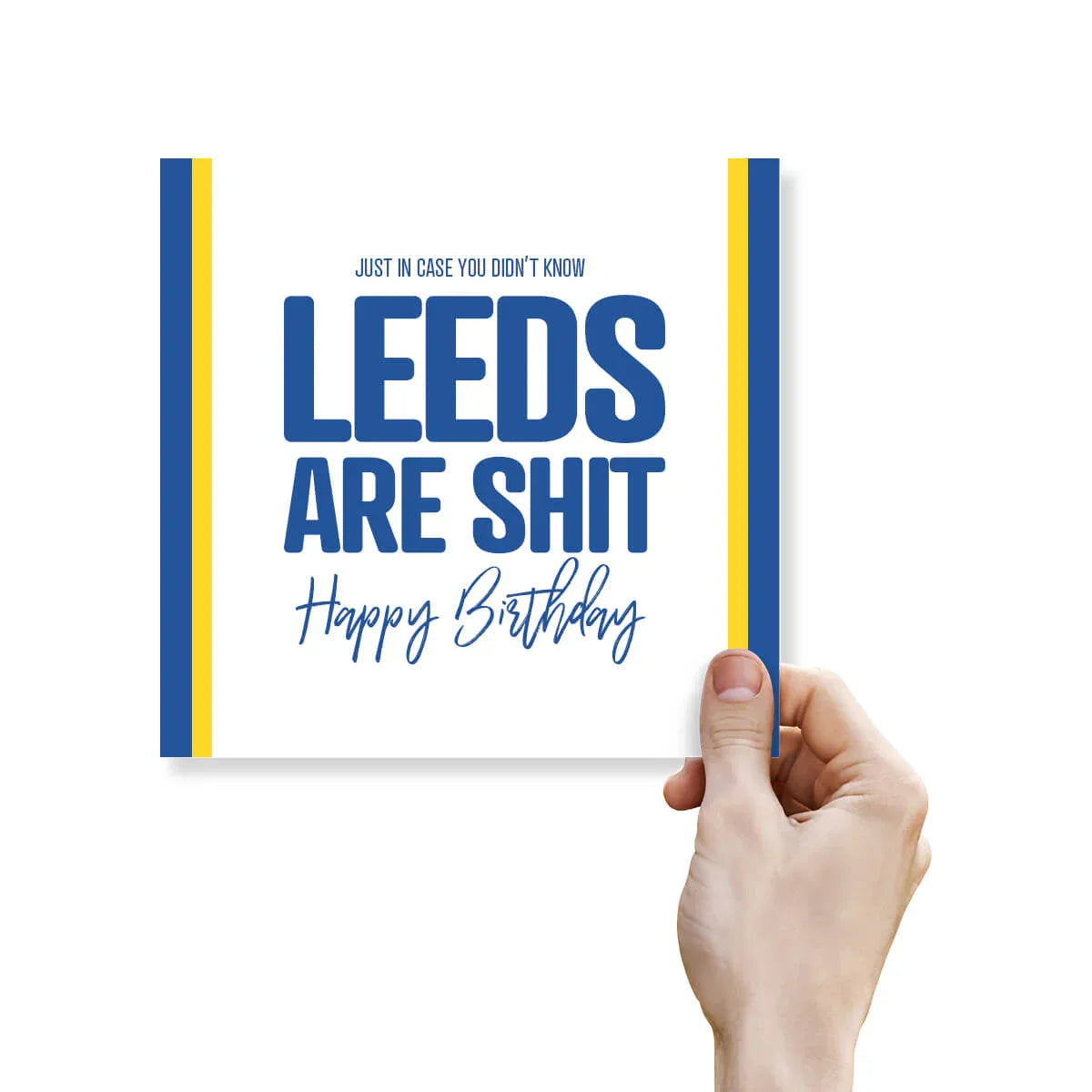 Funny rude Leeds United birthday card with bold blue text, yellow and blue stripes, held by hand