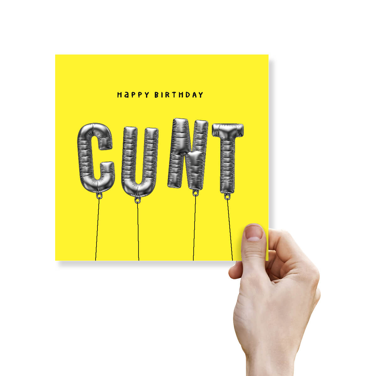 Hand holding a yellow birthday card with 'Happy Birthday CUNT' text on a white background