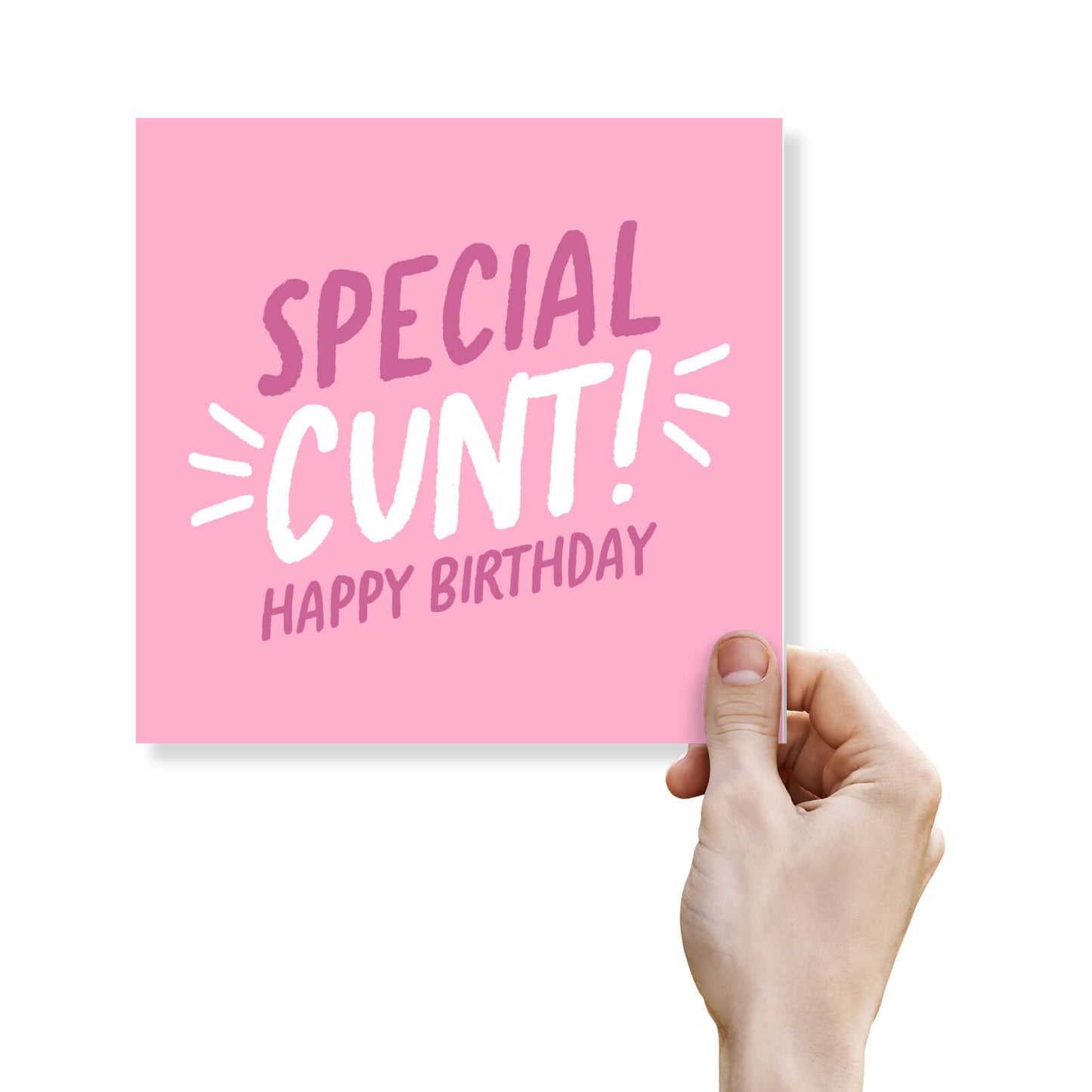 Pink card with offensive language held by a hand on a white background