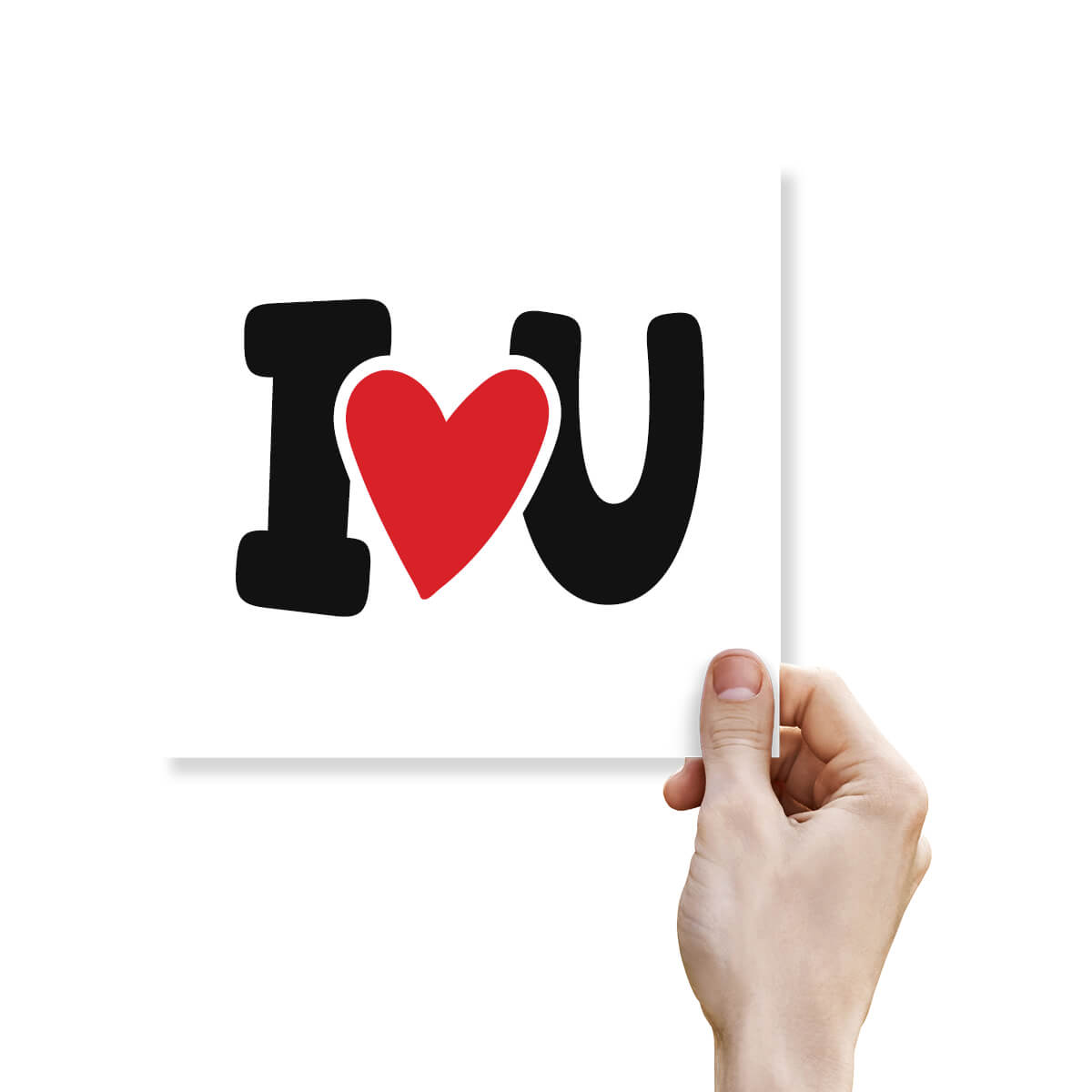 Hand holding a sign with 'I ❤️ U' on a white background