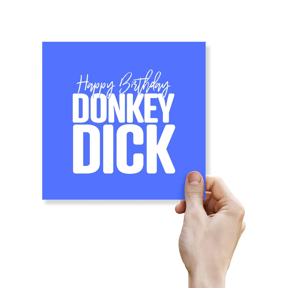 Hand holding a blue card with 'Happy Birthday DONKEY DICK' text on a white background