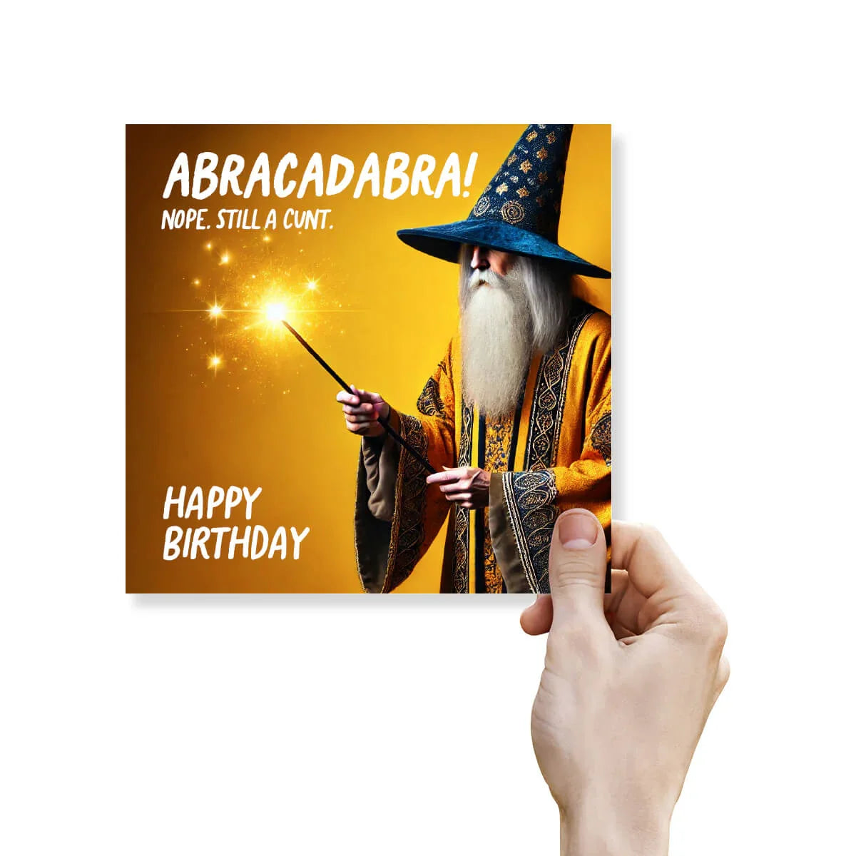 Birthday card with wizard holding a wand, text 'Abracadabra! Nope. Still a cunt. Happy Birthday' on a yellow background.