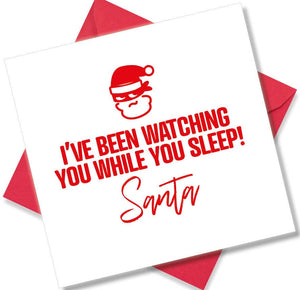 funny christmas card saying I’ve Been Watching You While You Sleep Santa